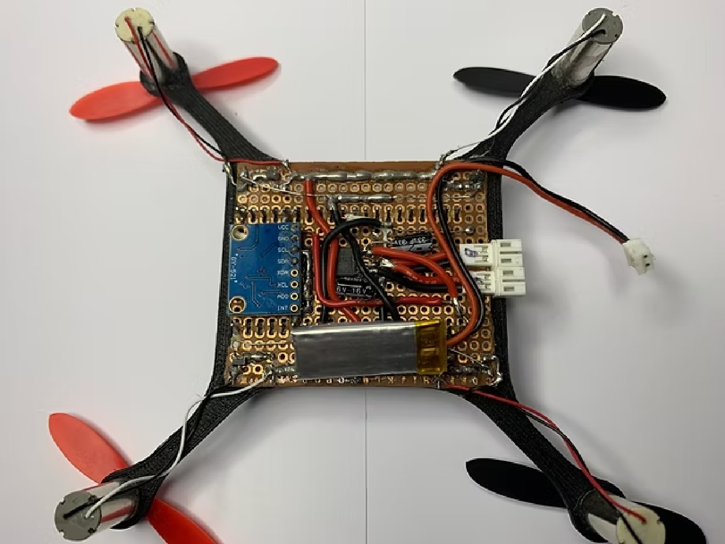 Bottom view: ESP32, gyro board, power wiring, and motor drive circuitry placement.